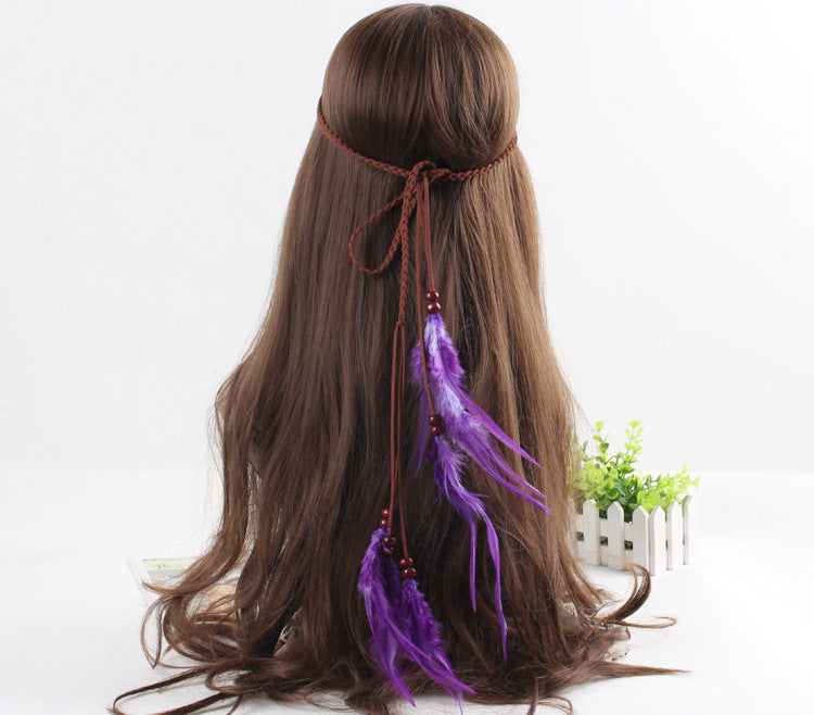 Braided brown suede band with purple feather hair tie