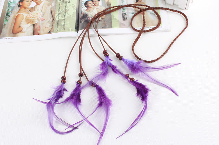 Braided brown suede band with purple feather hair tie