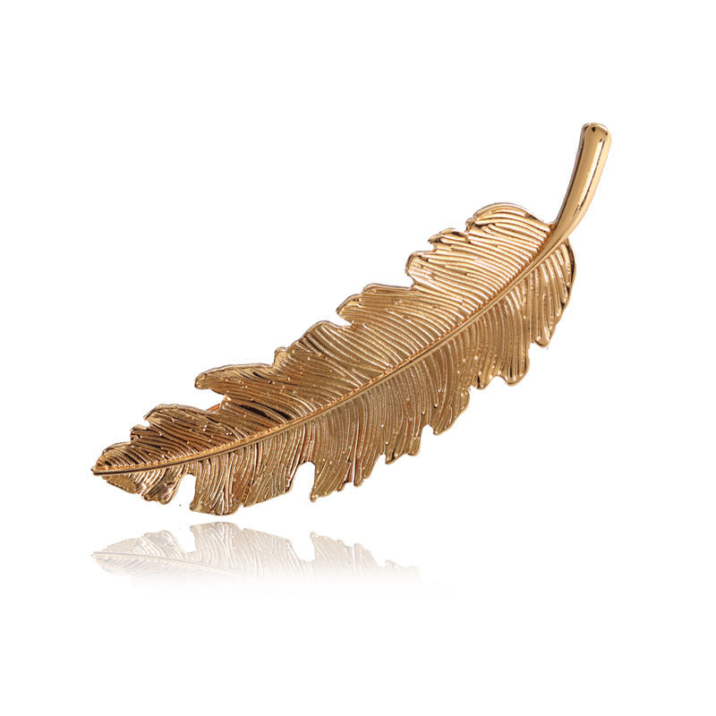 Metallic feather hair barrette