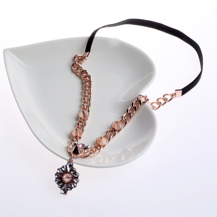 Dangling shiny gems & rivets head chain (front-head)
