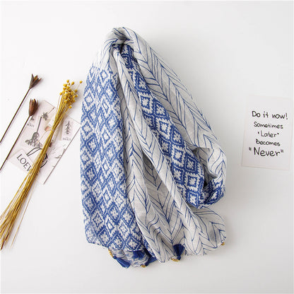 Multipattern blue long scarf with beaded tassels