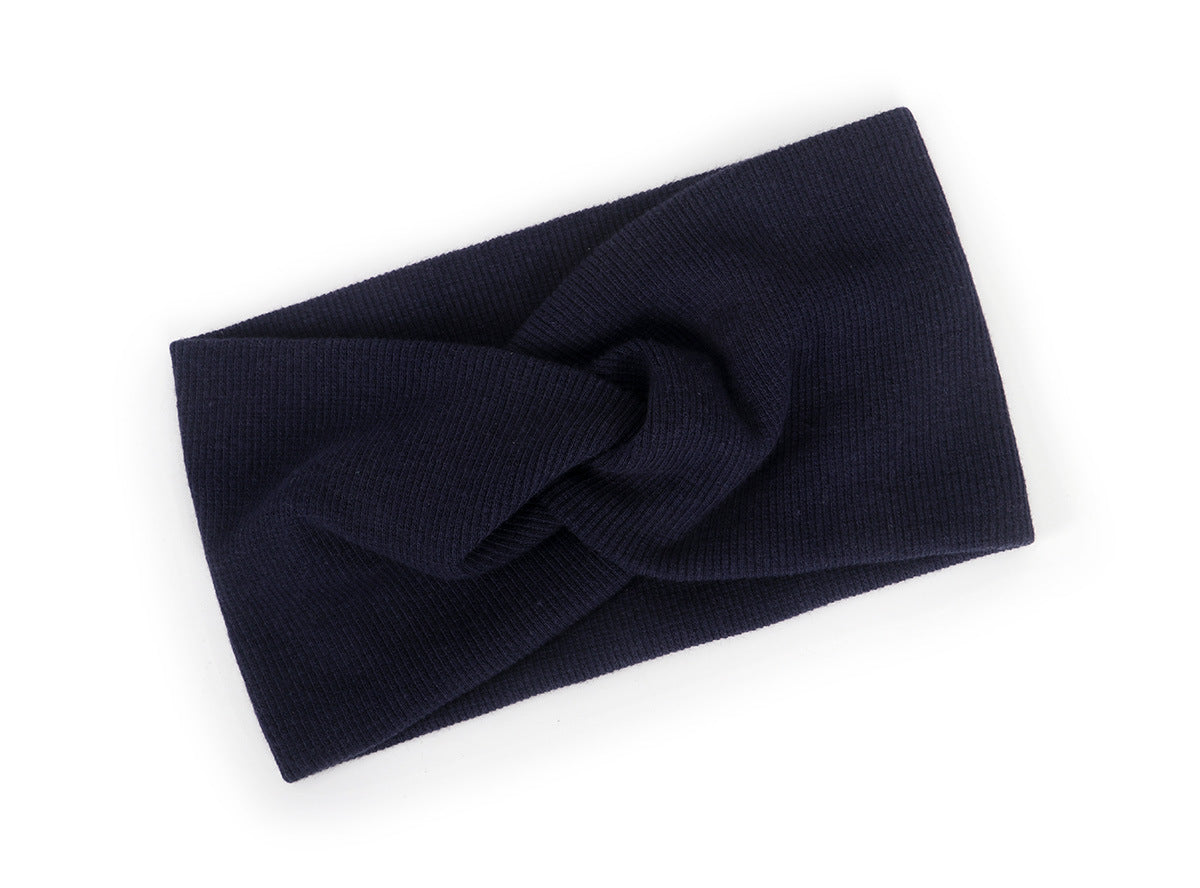 Twist front ribbed fabric stretch headband