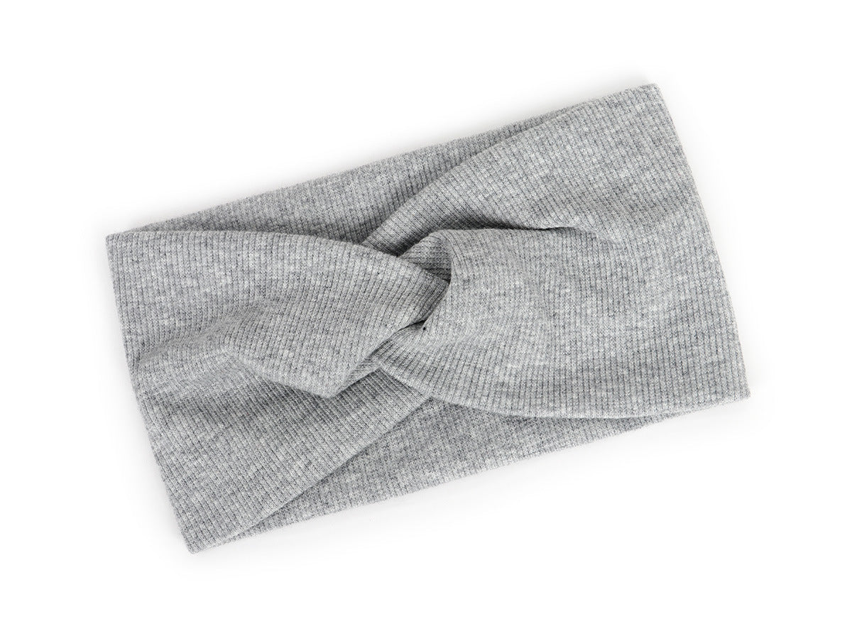 Twist front ribbed fabric stretch headband