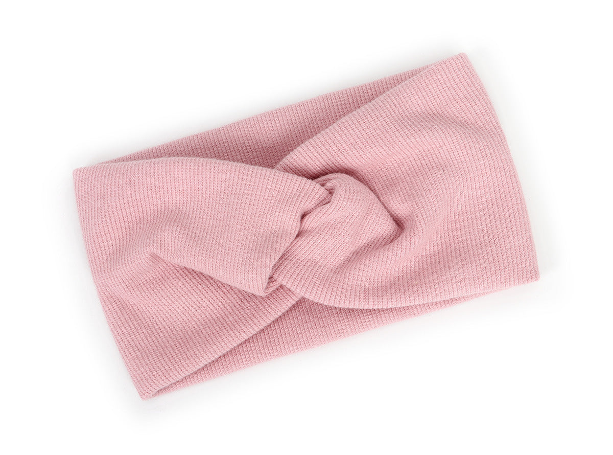 Twist front ribbed fabric stretch headband