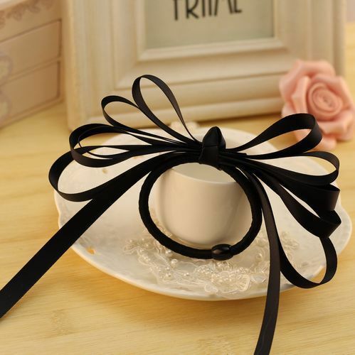 Multi-layered satin ribbon bow hair tie