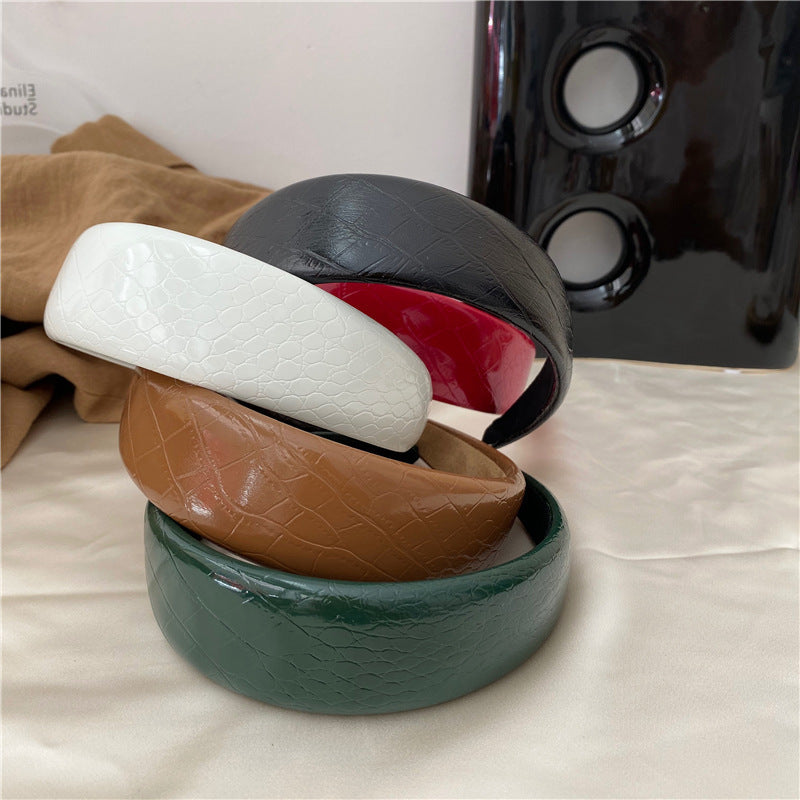 Stone patterned thinly padded leather headband