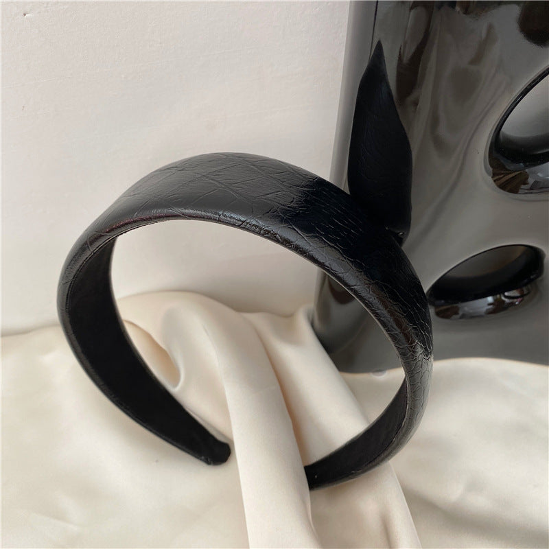 Stone patterned thinly padded leather headband
