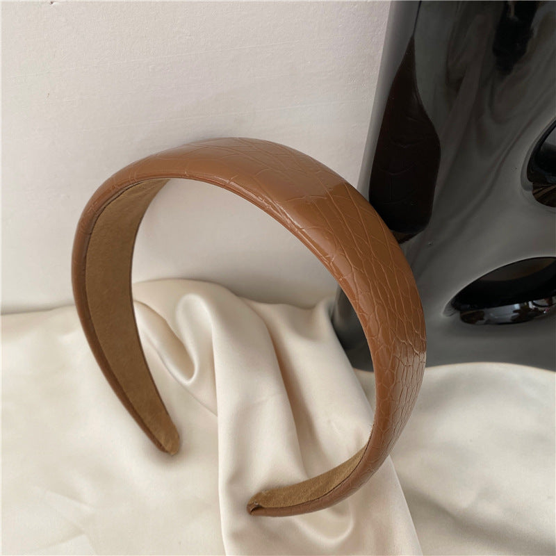 Stone patterned thinly padded leather headband