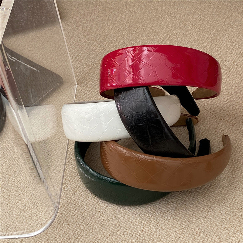 Stone patterned thinly padded leather headband