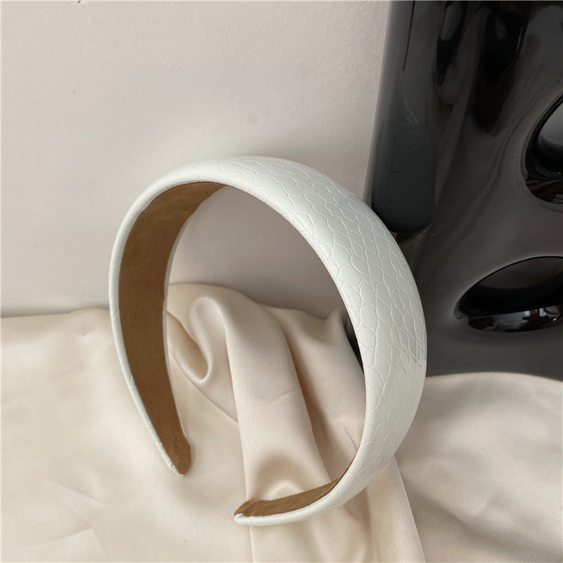 Stone patterned thinly padded leather headband