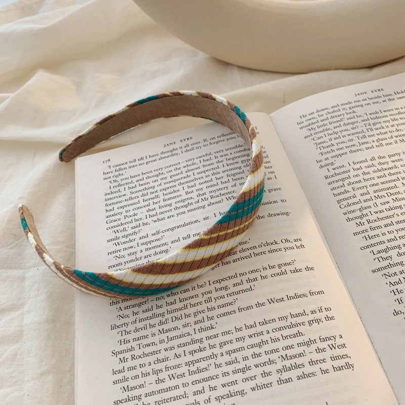 Multi-coloured knitted top headband