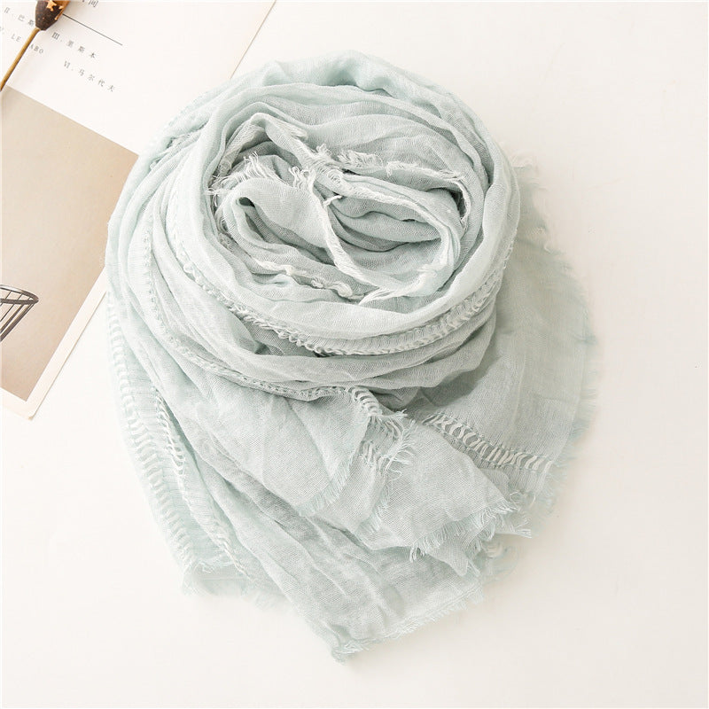Fringed hollow solid long scarf