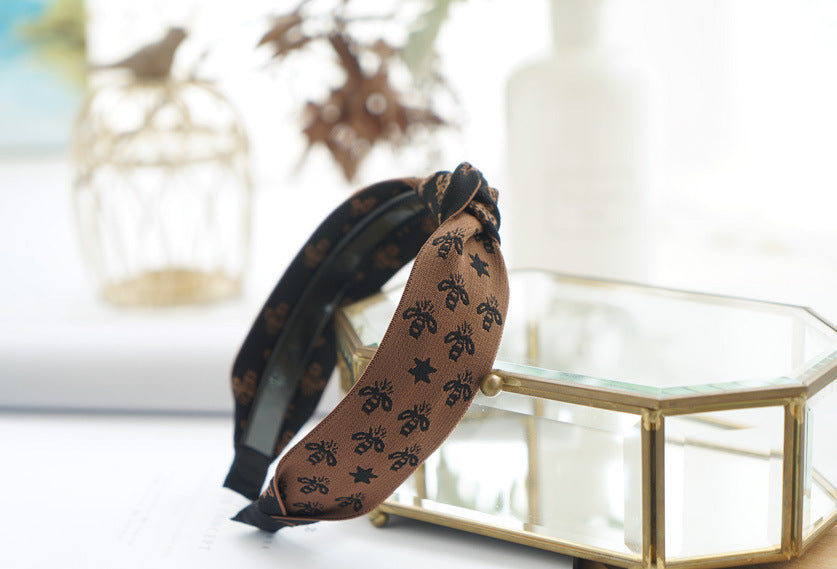 Bee patterned ribbon knotted headband