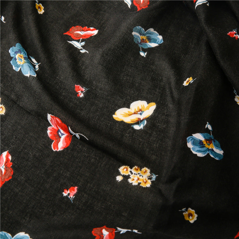 Black long scarf with tassels in multicolour flowers print