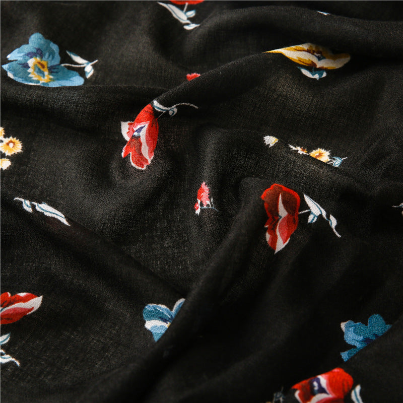 Black long scarf with tassels in multicolour flowers print