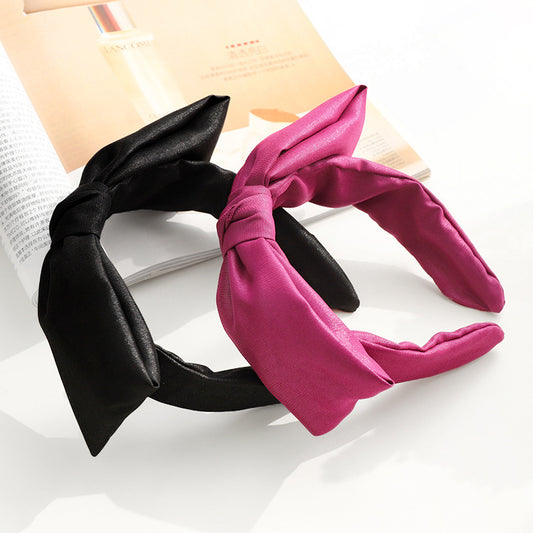 Glossy fabric headband with bow