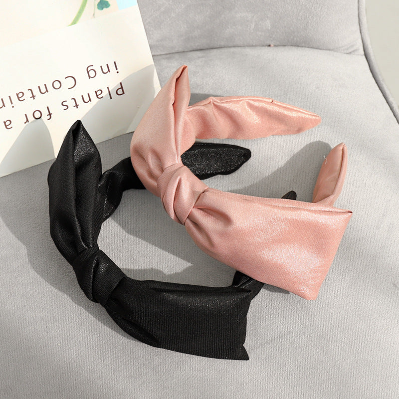 Glossy fabric headband with bow