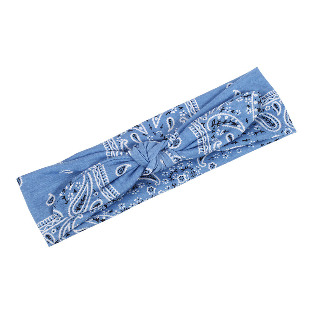 Paisley print stretchy headband with bow