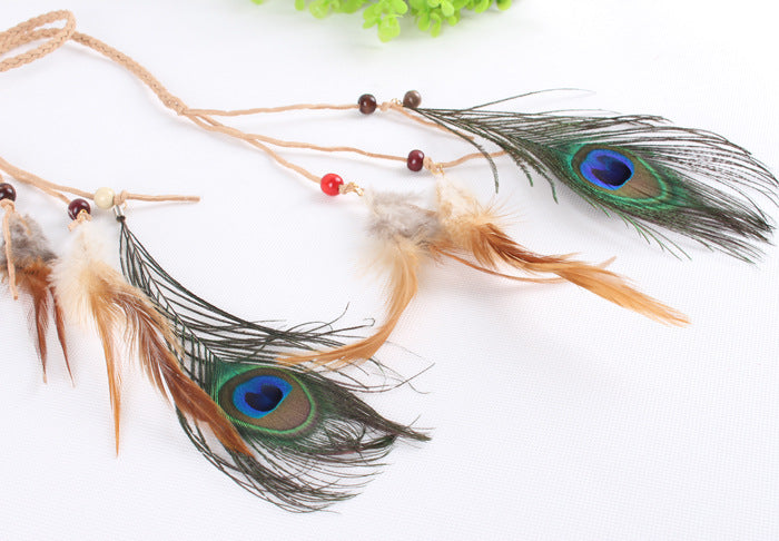 Braide suede tie with brown and peacock feathers