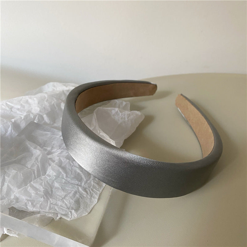 Thinly padded satin headband