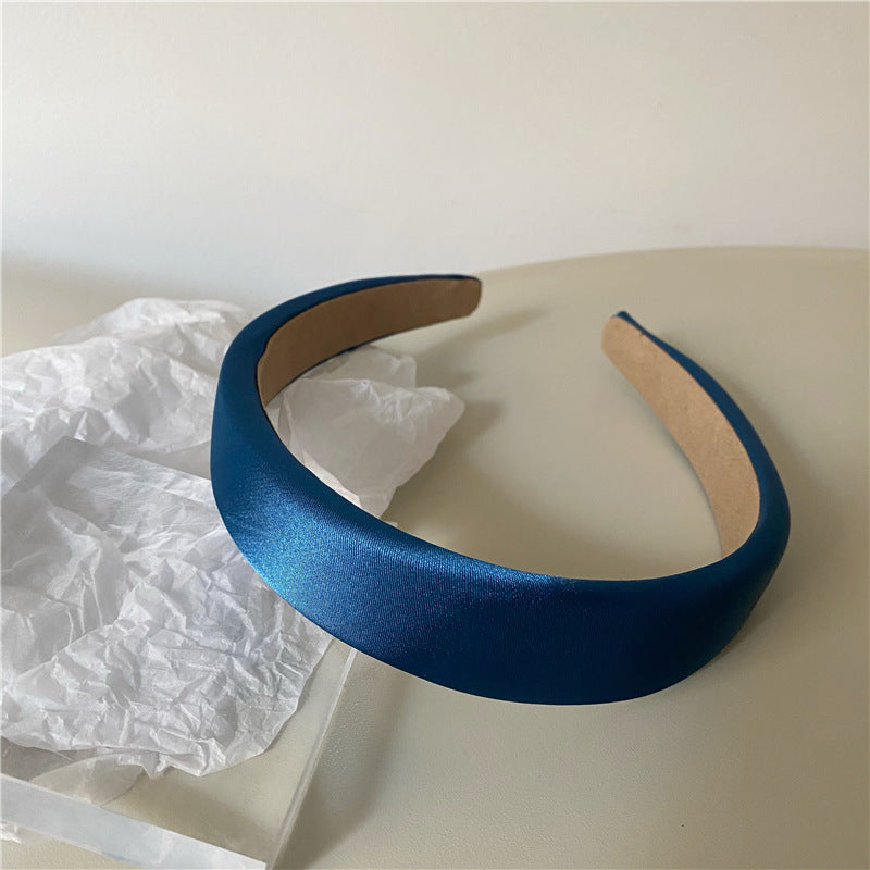 Thinly padded satin headband