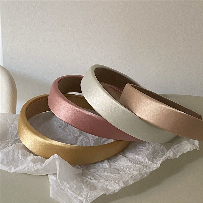 Thinly padded satin headband