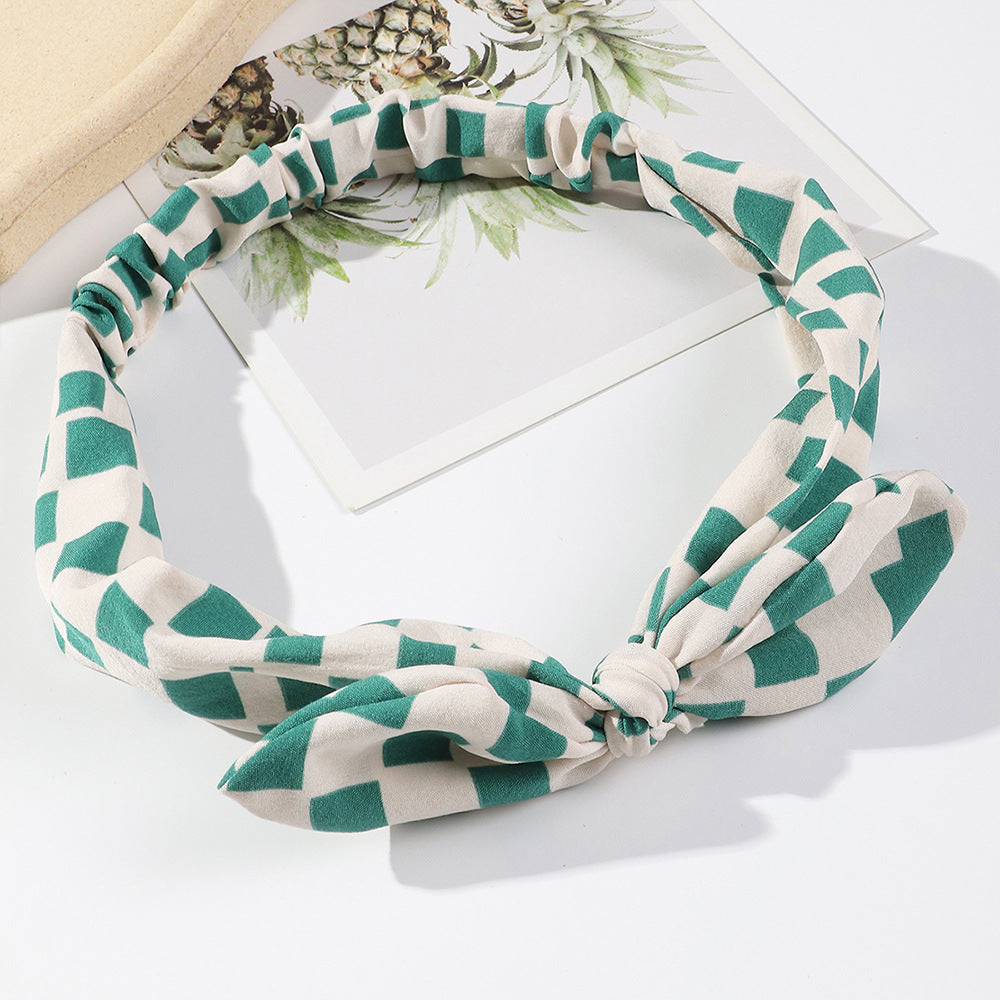 Squares patterned elastic headband with bow
