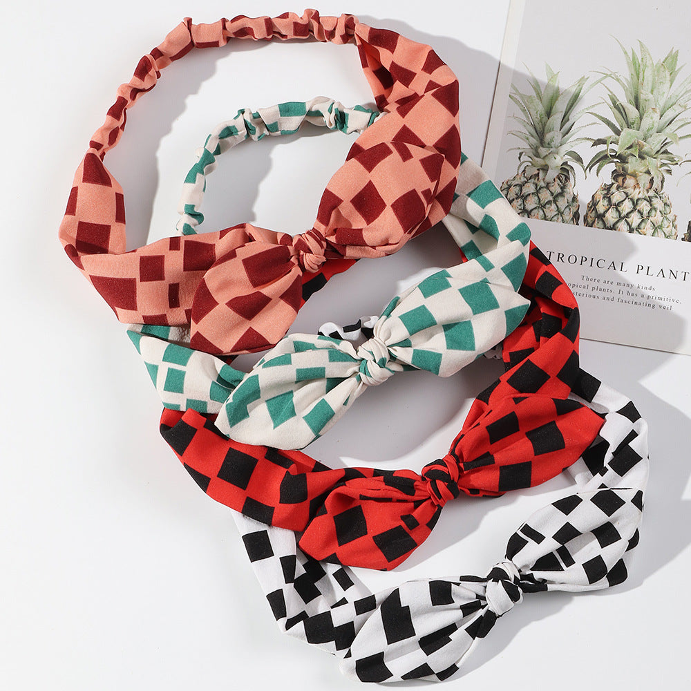 Squares patterned elastic headband with bow