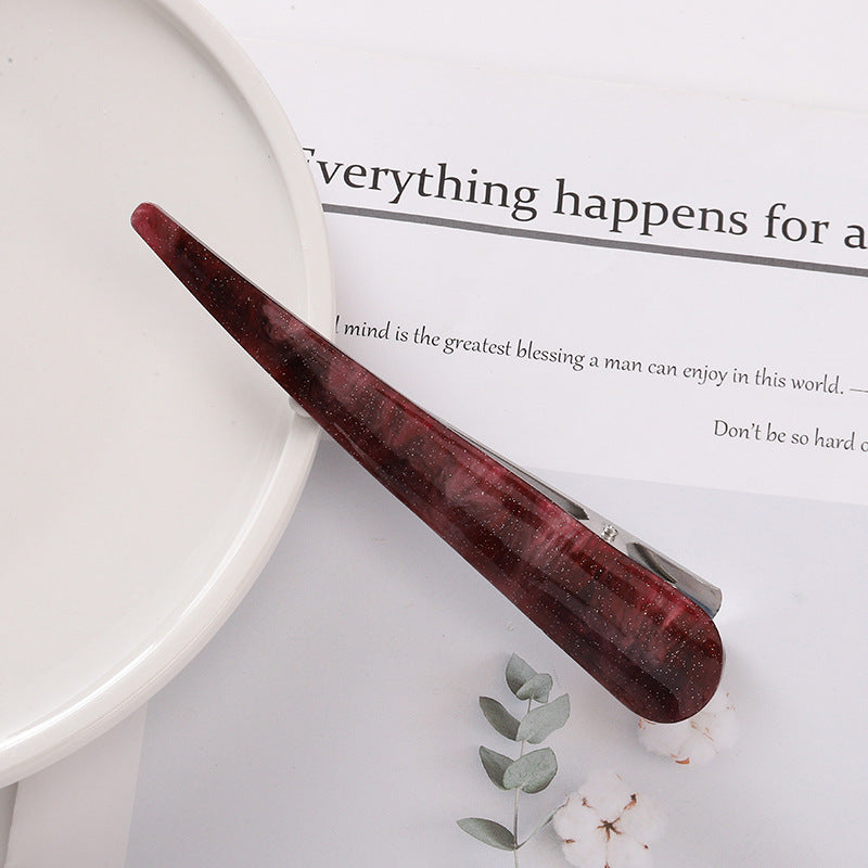 Resin ibis clip with glitters