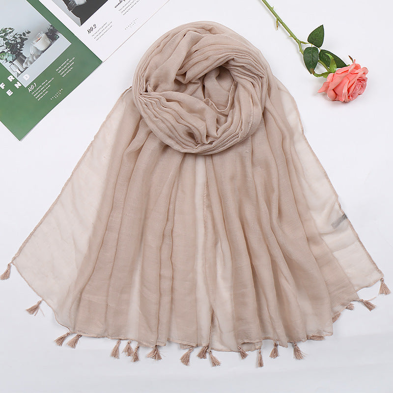 Plain long scarf with tassels