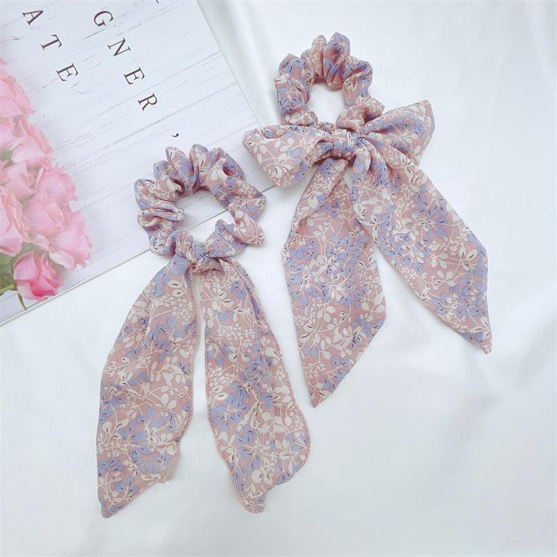 Floral scrunchies in blue and lilac