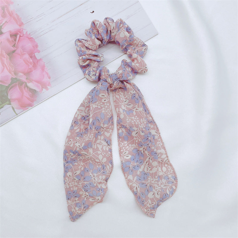 Floral scrunchies in blue and lilac