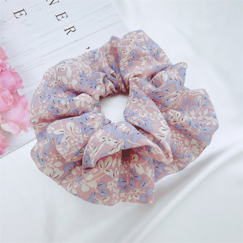 Floral scrunchies in blue and lilac