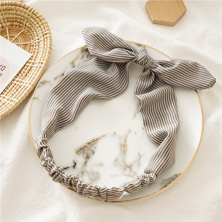 Strips print elastic headband with bow