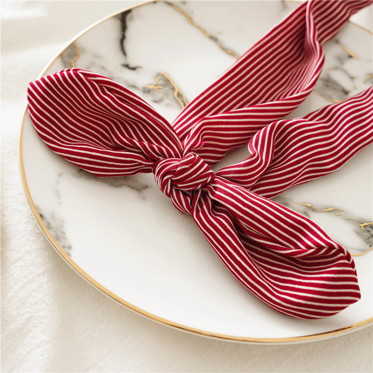 Strips print elastic headband with bow