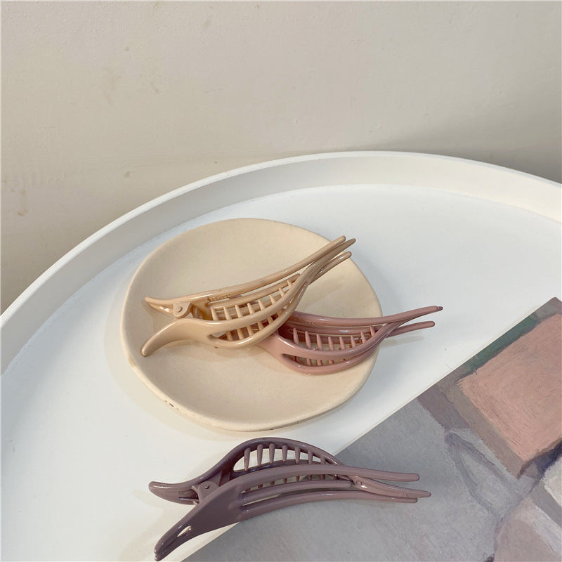 Smooth acrylic Ibis clip with teeth
