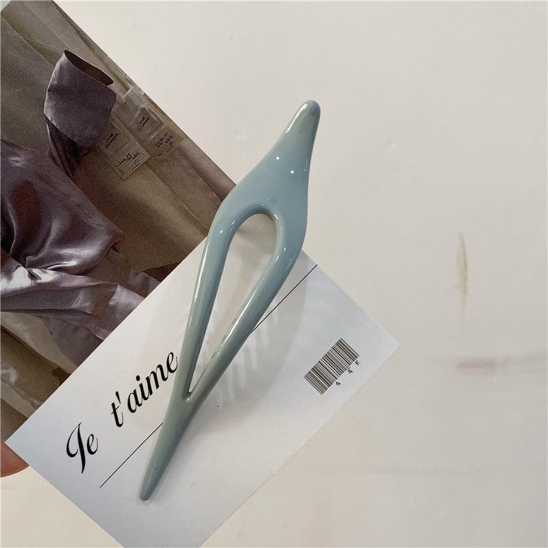 Smooth acrylic Ibis clip with teeth