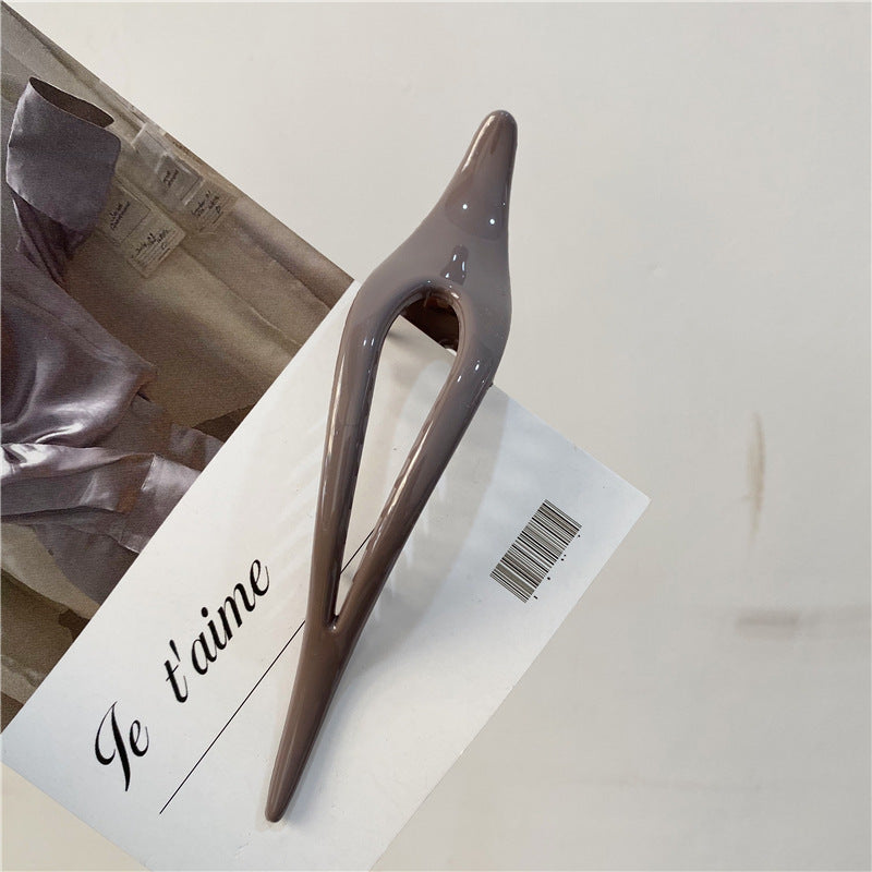 Smooth acrylic Ibis clip with teeth