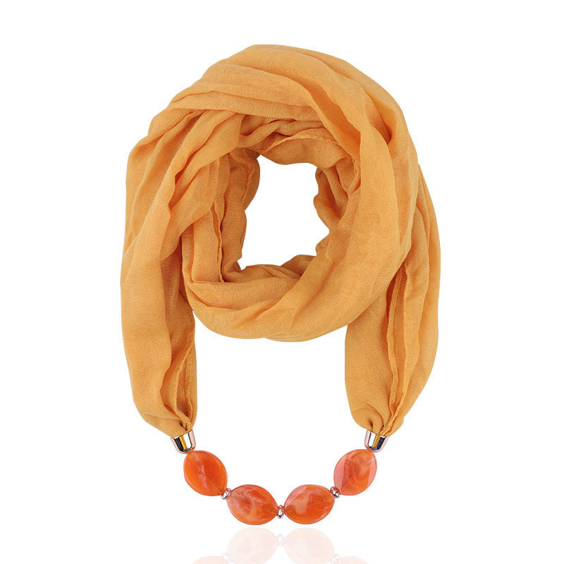 Plain infinity scarf with jewellery