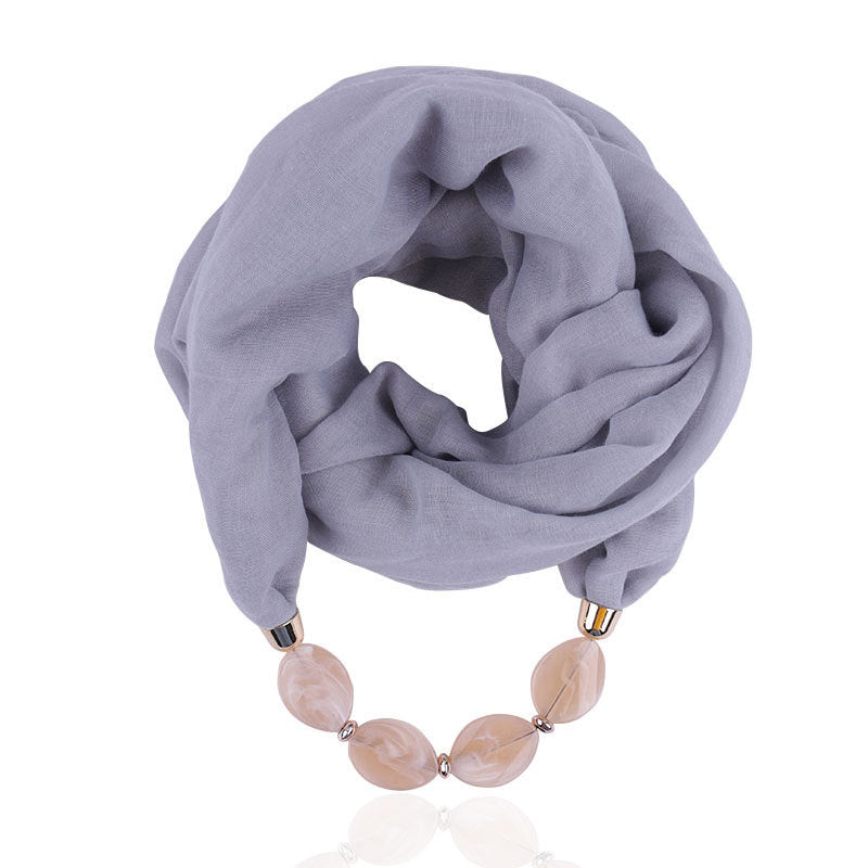 Plain infinity scarf with jewellery