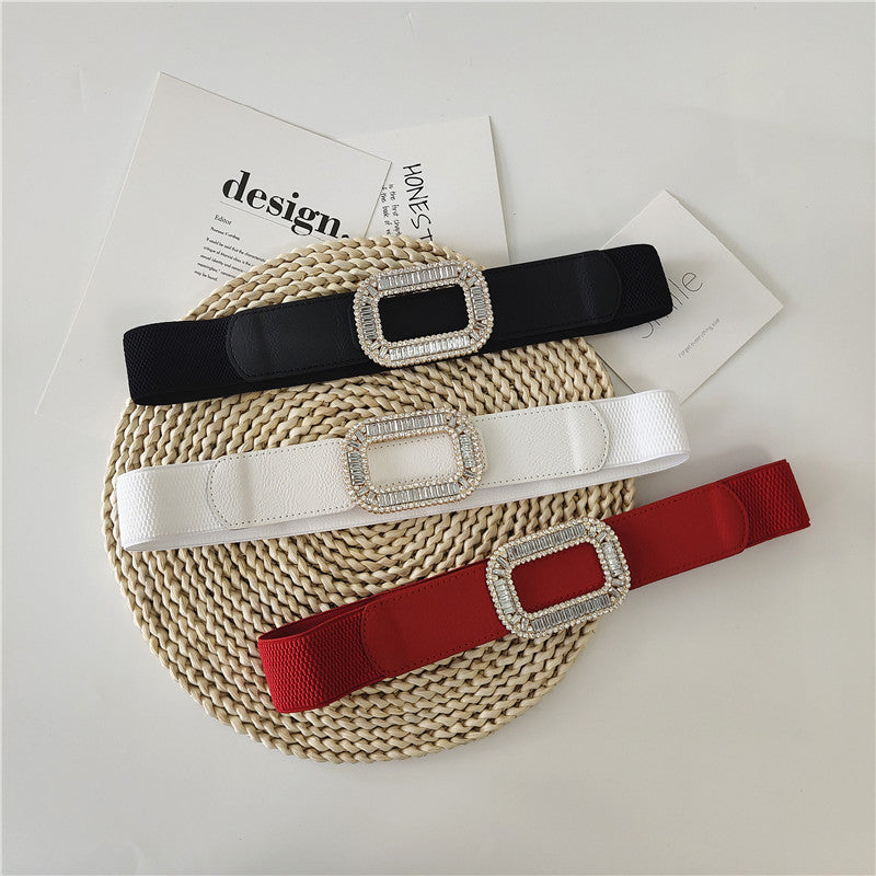 Stretch wide belt with shiny gems studded buckle