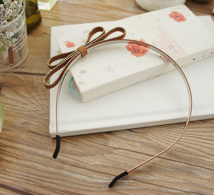 Suede slim headband with bow