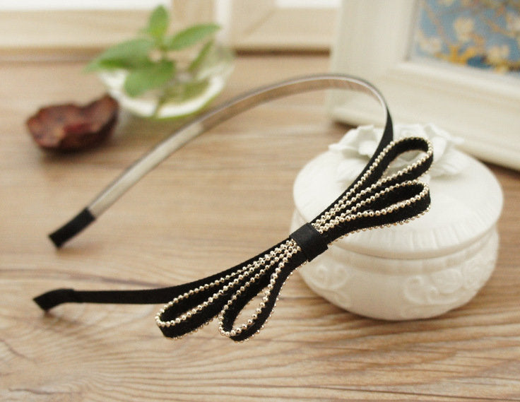 Suede slim headband with bow