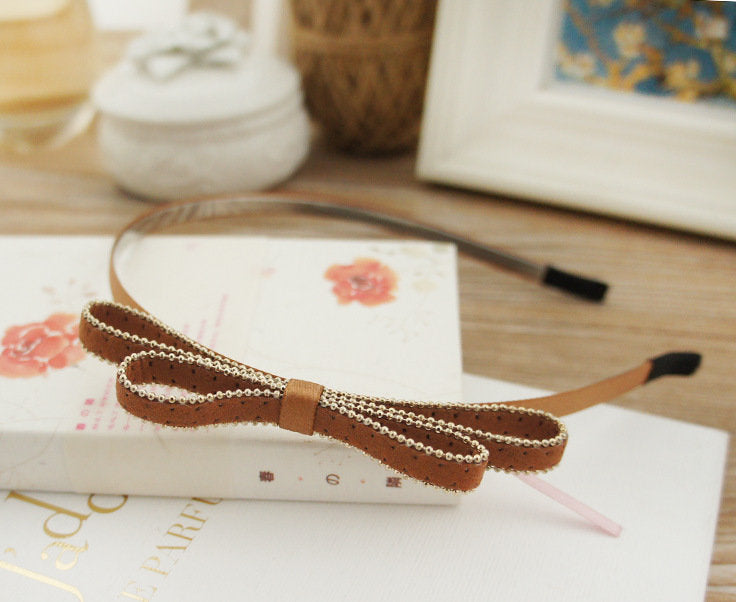 Suede slim headband with bow