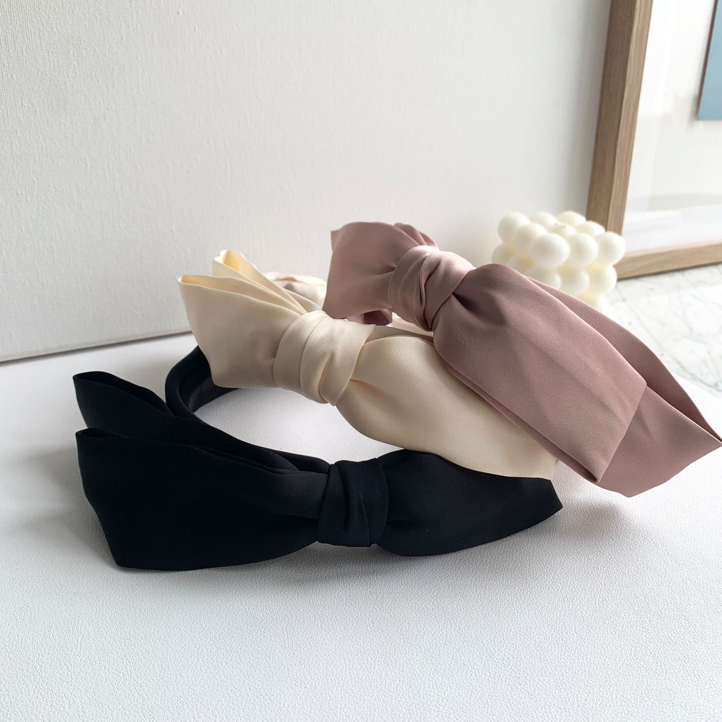 Soft headband with large bow in plain colours
