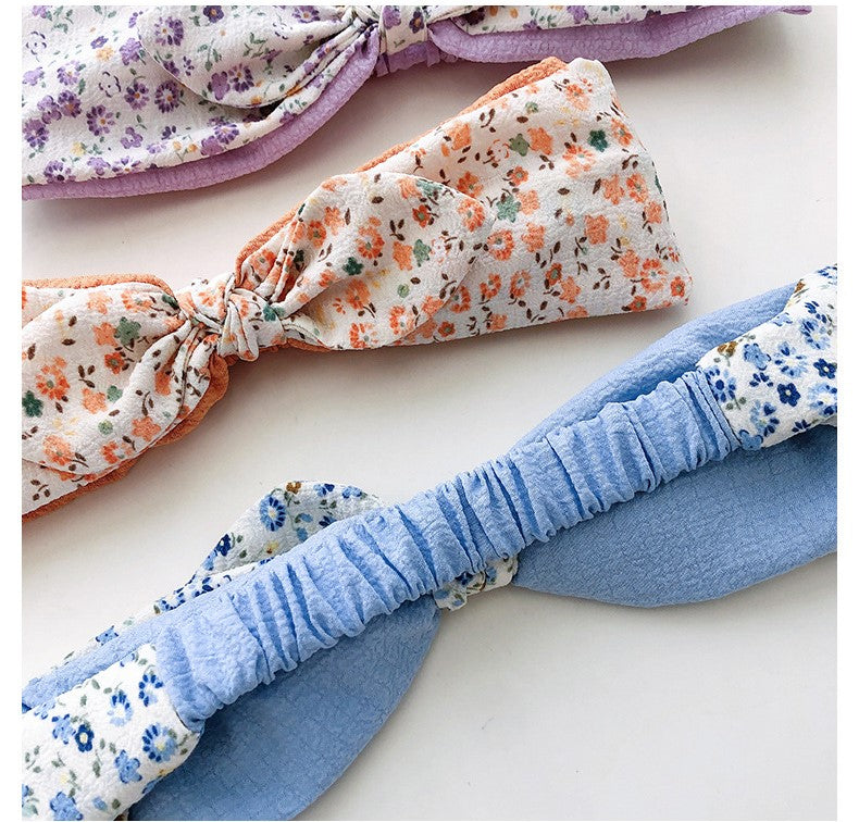Knotted floral elastic headband