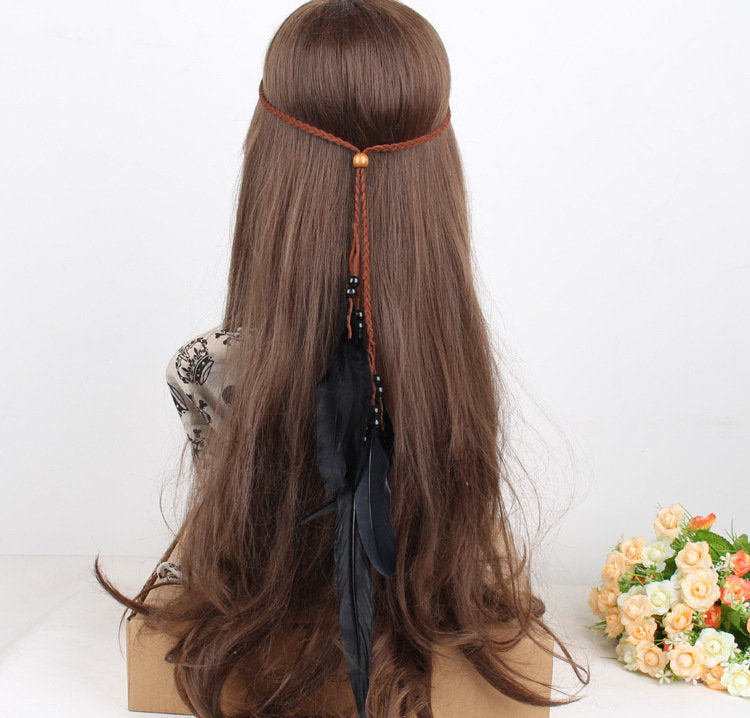 Braided brown suede band with black feather hair tie