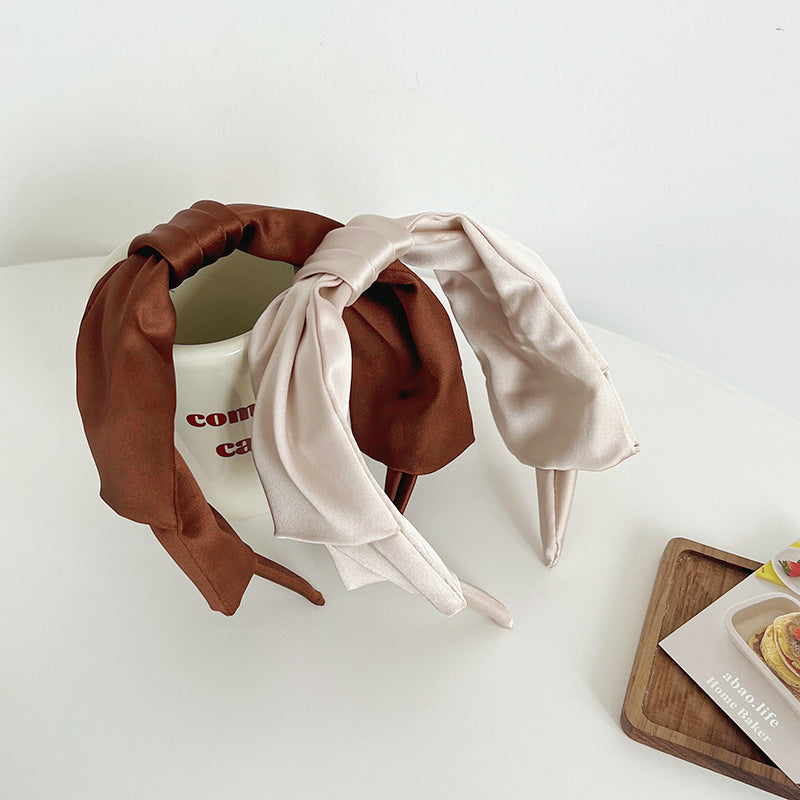 Large bow knotted satin headband