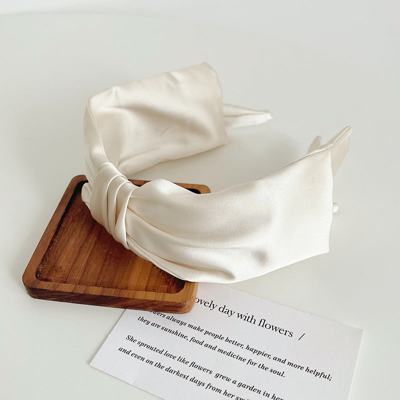 Large bow knotted satin headband