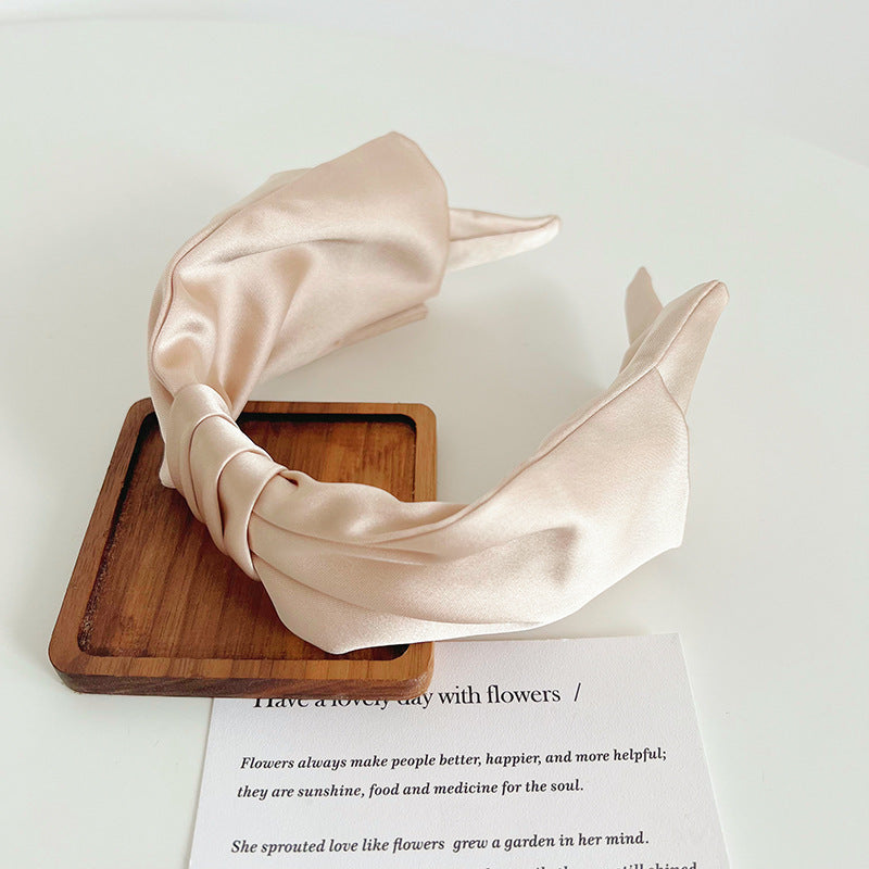 Large bow knotted satin headband